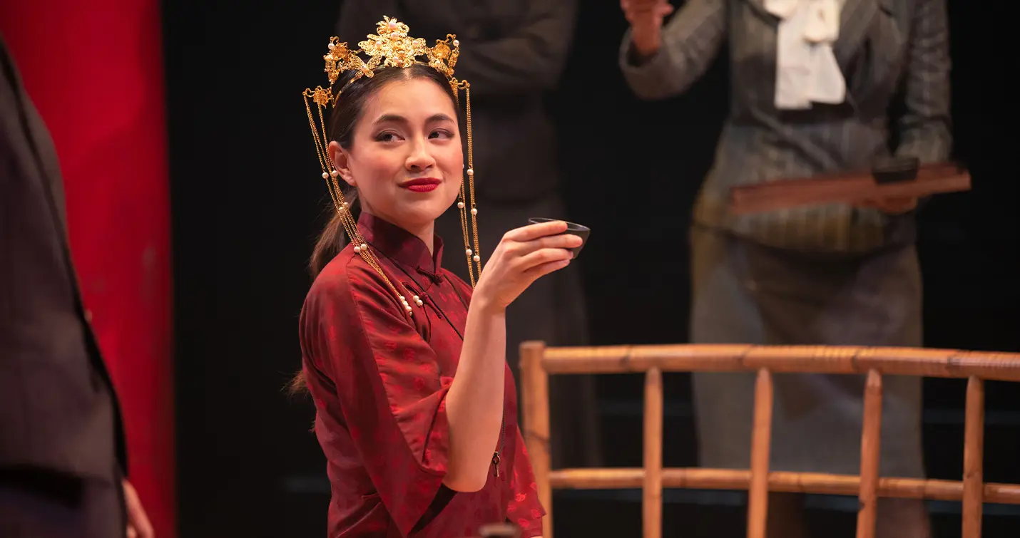 Actor Kimie Tsukakoshi on stage for The Poison of Polygamy